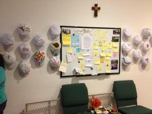 Mission Team hats on display outside the church sanctuary